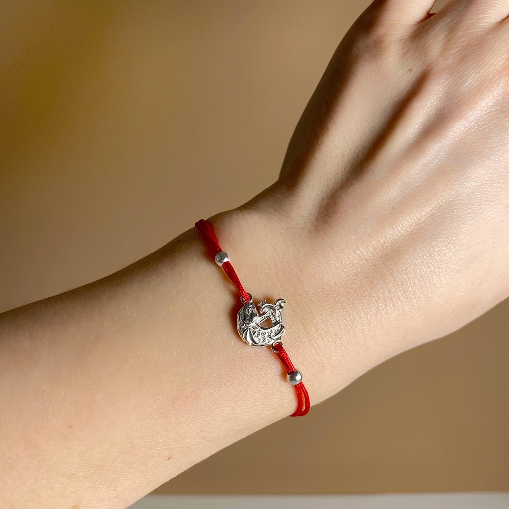 Браслет на нити «Рыбка» серебро